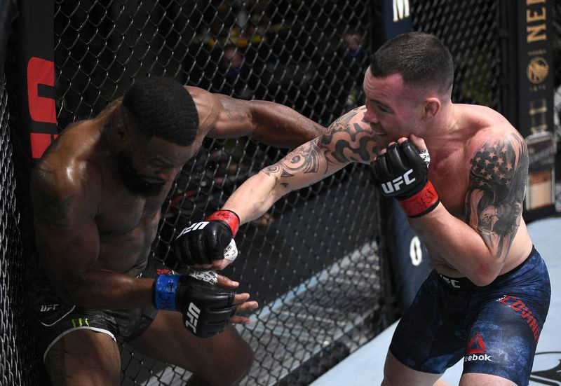 Colby Covington vence a Tyron Woodley por nocaut técnico en cartelera de UFC | Revista de revisión de Las Vegas